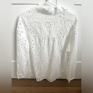 NWOT beautiful button up blouse with long sleeves.